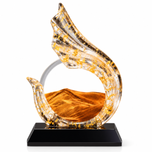 Shangju sweeping gold-accent resin sculpture with circular sand-art display on black base